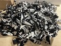 Black white oval rug with rainbow thread