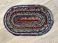 Black and bright scrap rope rug or table topper