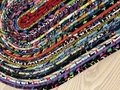 Black and bright scrap rope rug or table topper