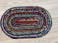 Black and bright scrap rope rug or table topper
