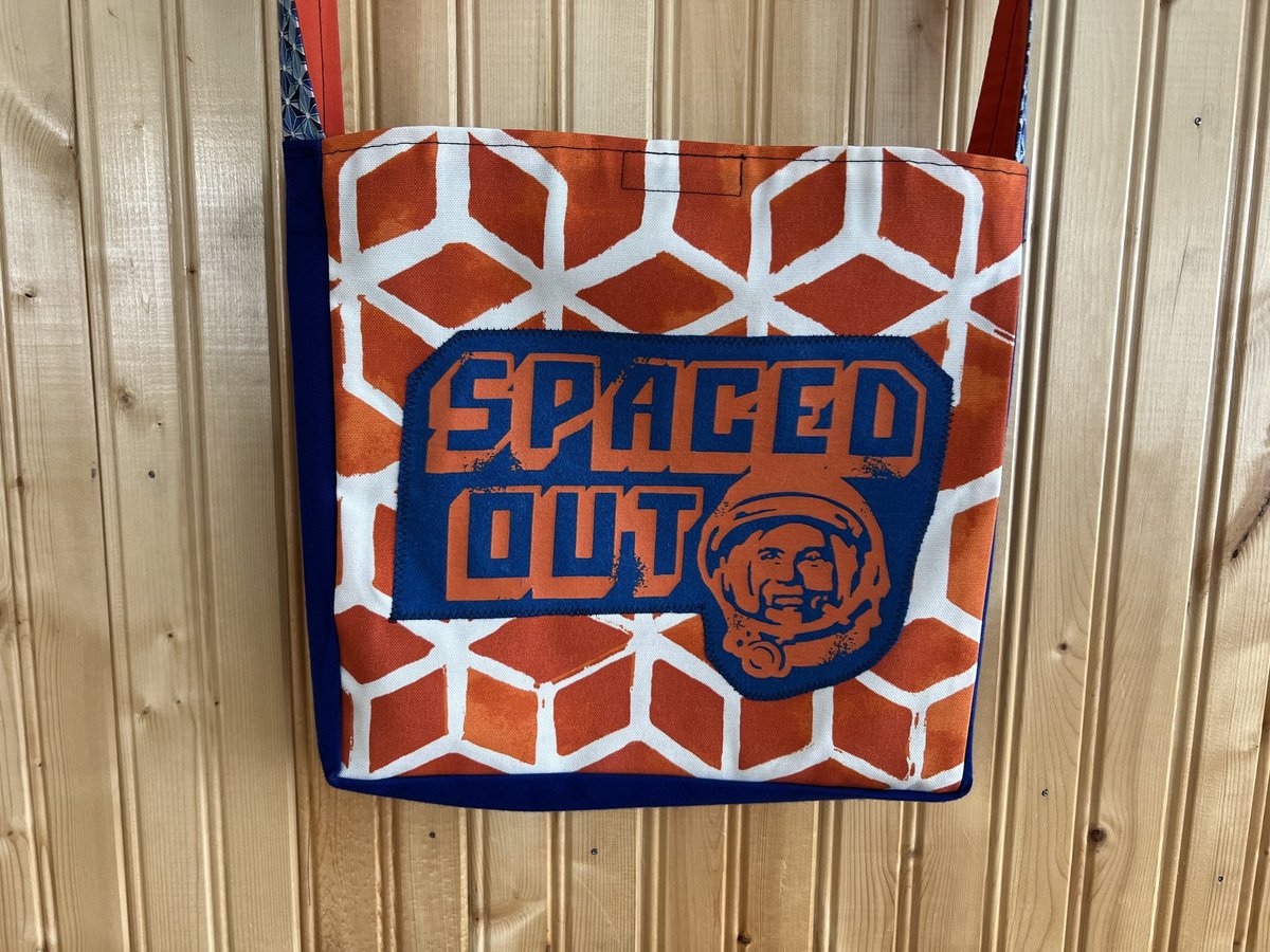 Spaced out tshirt crossbody bag 
