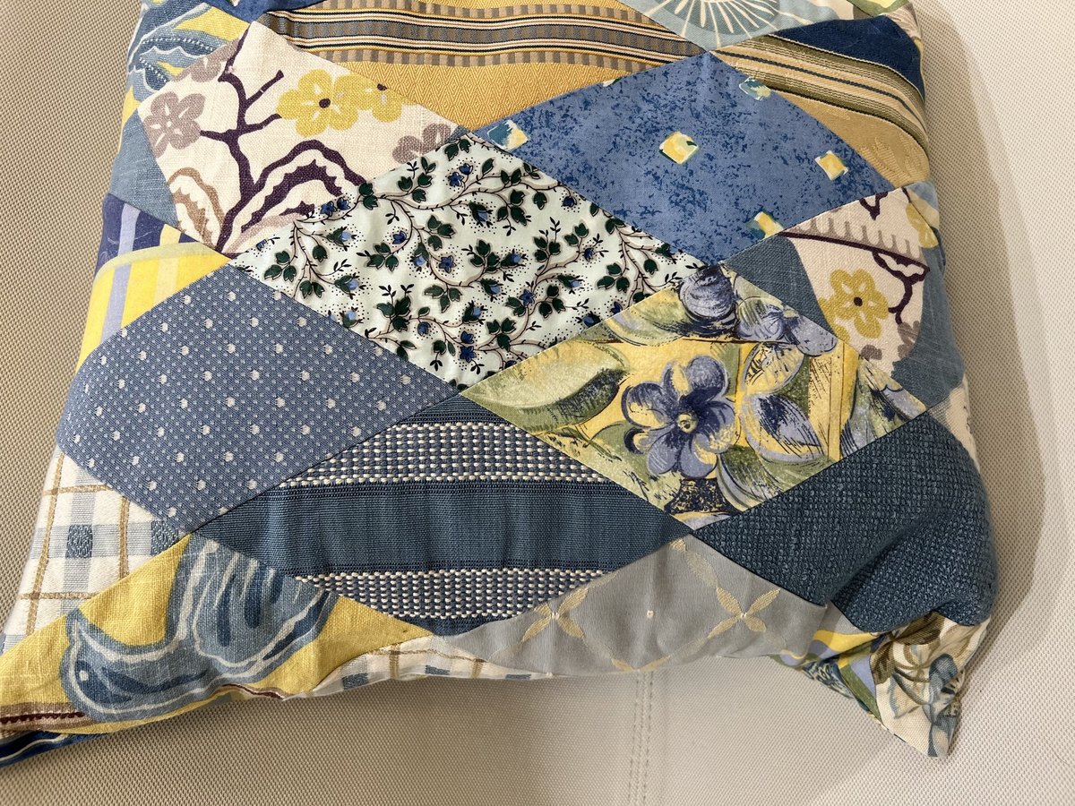 Blue and yellow diamond pillow