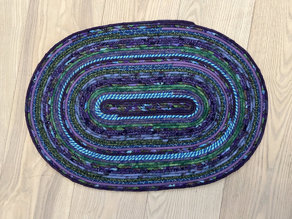 Purple and green rope wrapped rug or tabletopper