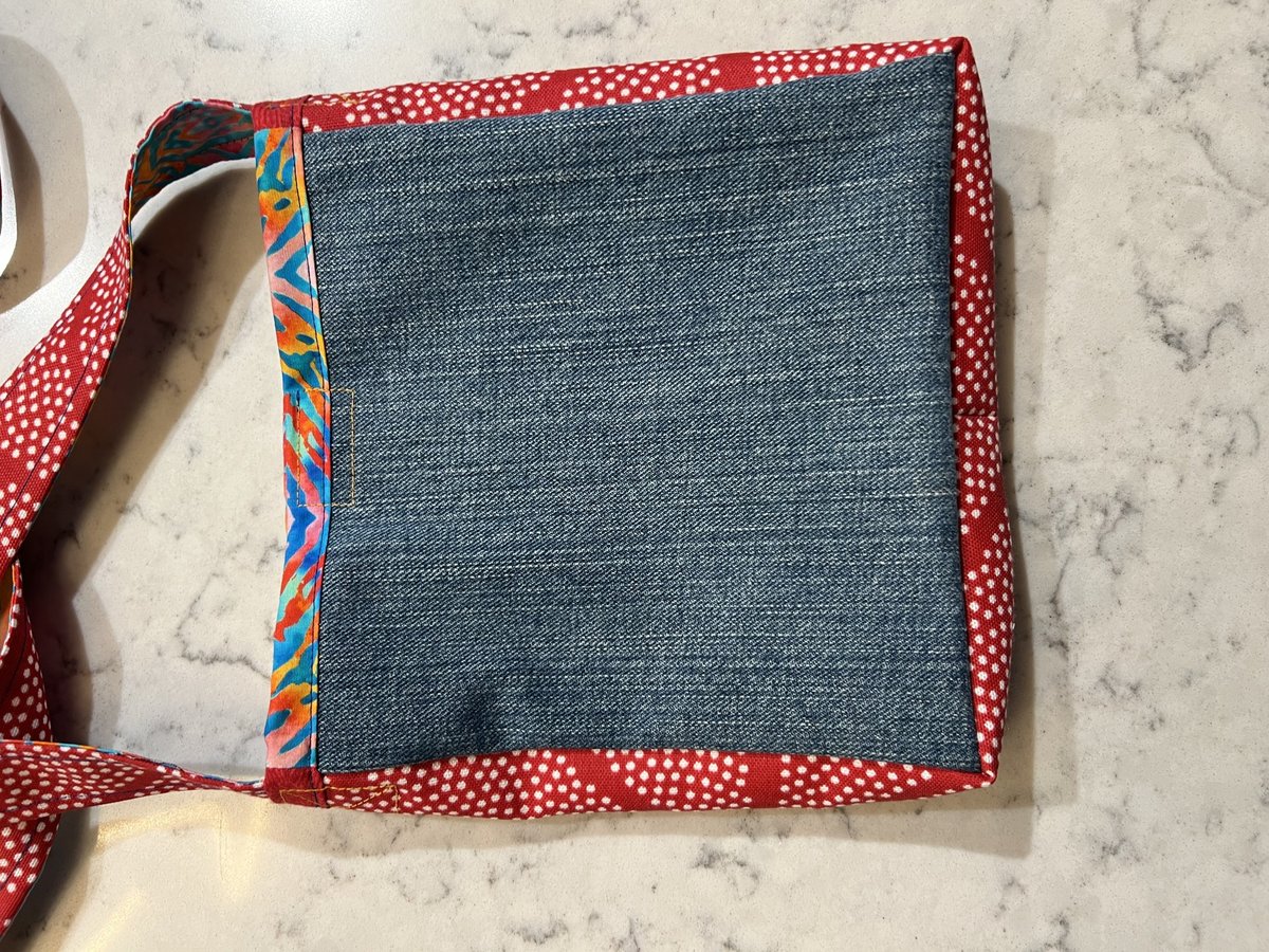 Real Eyes crossbody bag