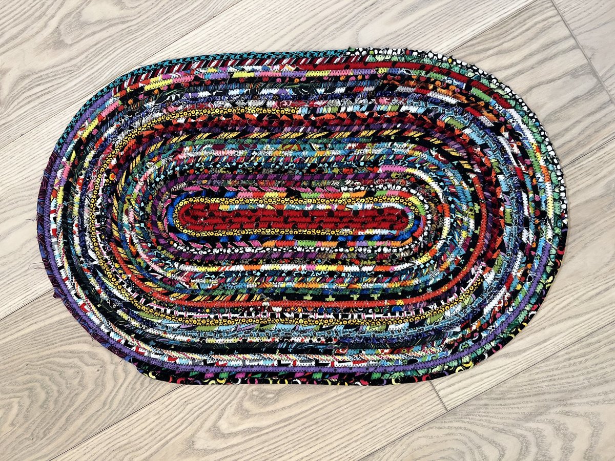 Black and bright scrap rope rug or table topper