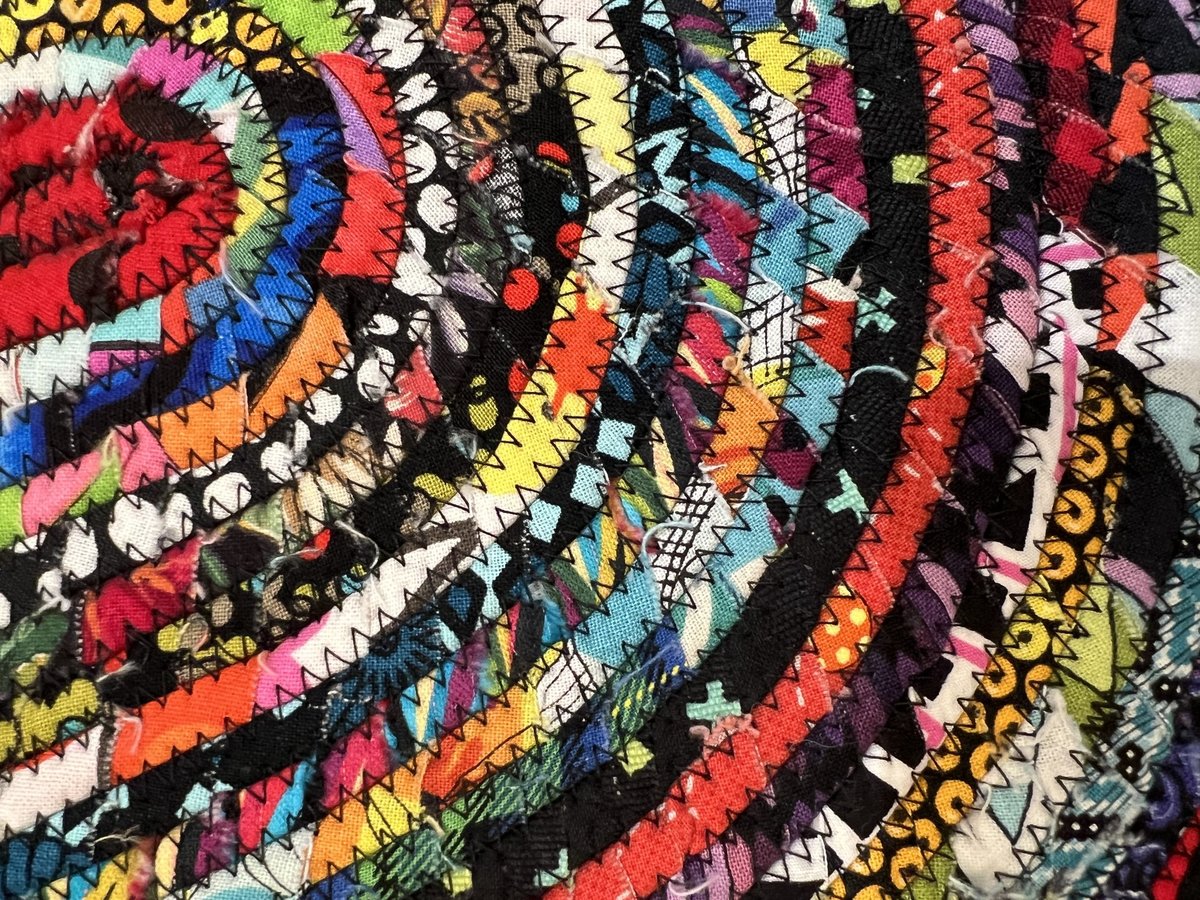 Black and bright scrap rope rug or table topper