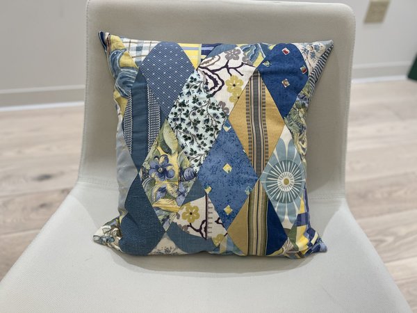 Blue and yellow diamond pillow