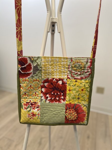 Red and yellow floral patchwork quilted crossbody bag