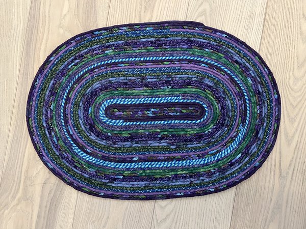 Purple and green rope wrapped rug or tabletopper